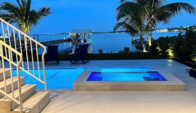 Beautiful bay home with one-of-a-kind water view, pool,spa, an a private pier.