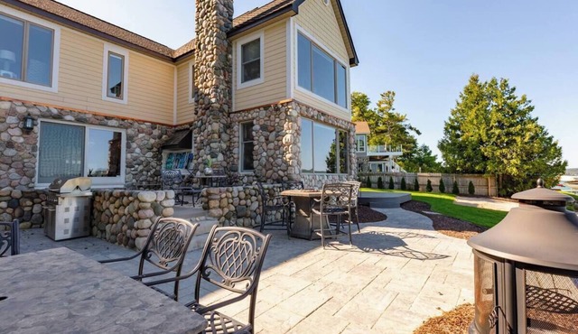 Beautiful Beach Front Home on Suttons Bay w/Sunset Views. Sleeps 10.