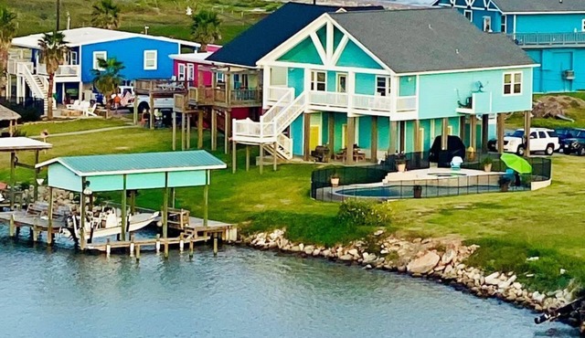 Beautiful beach house boasts a scenic water view from its front and back doors.