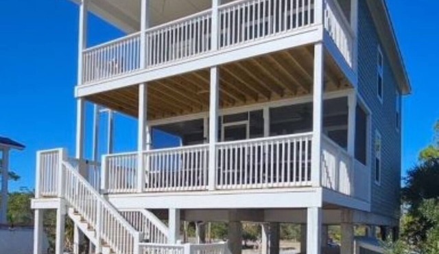 Beautiful beachfront home with private walkway to beach. BOAT PARKING