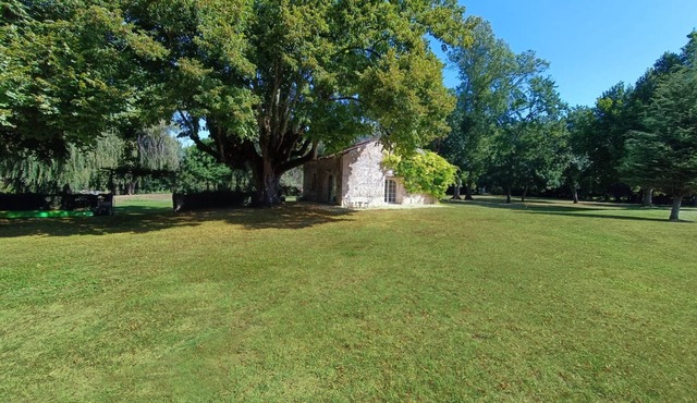Beautiful Boathouse by the River