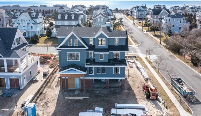 Beautiful BRAND NEW home with Ocean views, an in-ground pool, and an elevator.