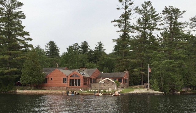 Beautiful Brant Lake home with direct lakefront, hot tub and snowmobile access!