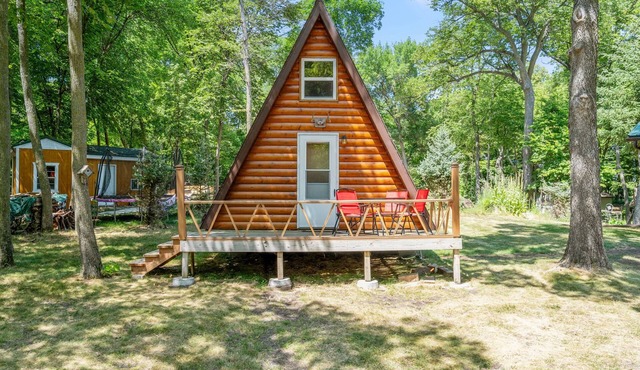 Beautiful cabin on lake with a dock on 1.5 acres private property