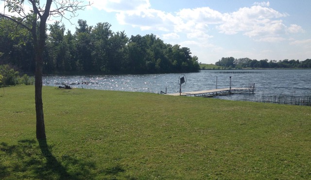 Beautiful cabin with level lot on Maple Lake. Sunset views on the point!