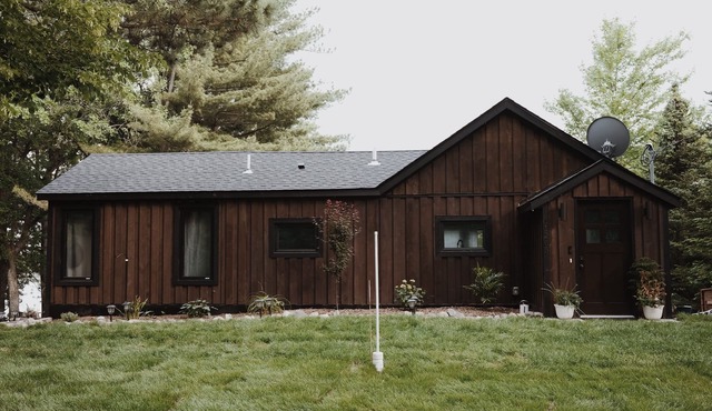 Beautiful cabin with a hot tub on a half acre of lake shore!