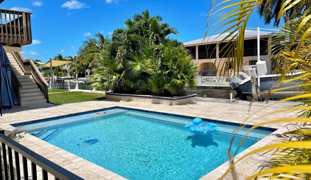 Beautiful Canal Front Heated/Chilled Pool 4 Bdr Home