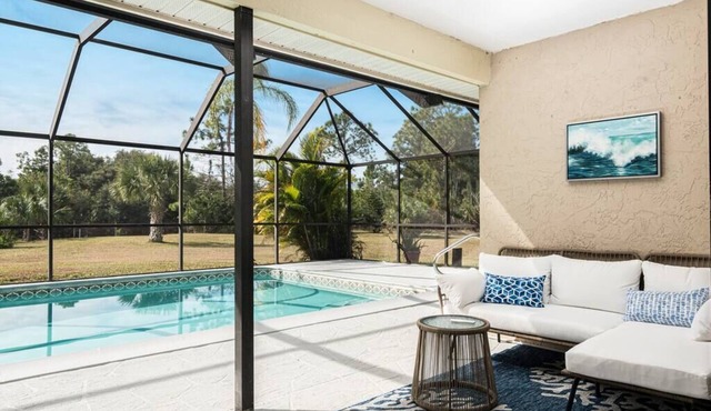 Beautiful Canal Front Home with Pool, Tennis Court