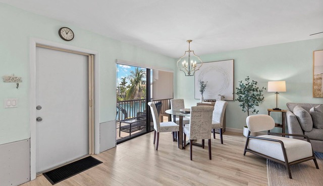 Beautiful Canal Front Tennisplace C32 Condo close to everything! NEW!