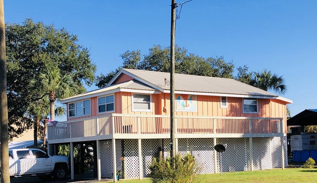 Beautiful Canal Front, Nautical Theme Home with downstairs outdoor TIki Bar