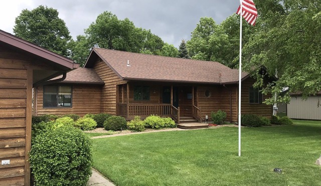 Beautiful cedar home and bunkhouse, large yard, & watersport equipment available