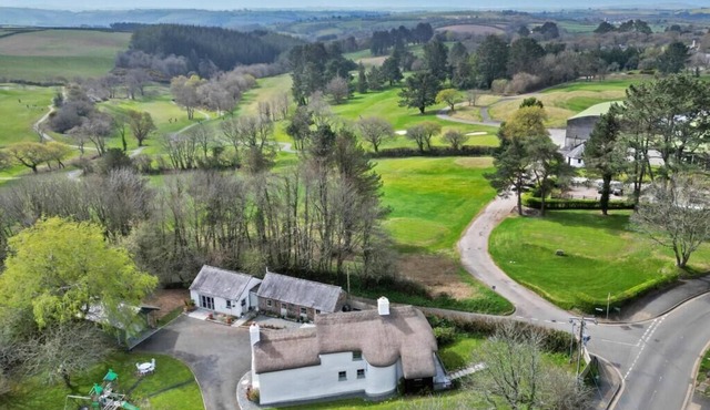 Beautiful character thatched farmhouse overlooking St Mellion golf course