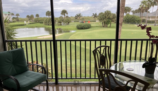 Beautiful Clean Condo, private veranda, steps from private beach and pool