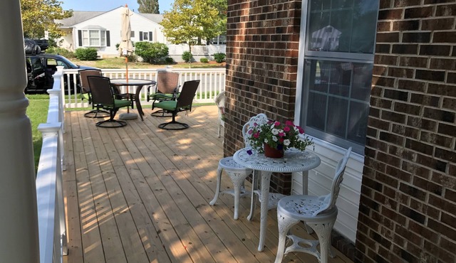 Beautiful corner property with cozy beach vibe.