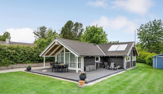 Beautiful cottage with kitchen and living area in one room.
