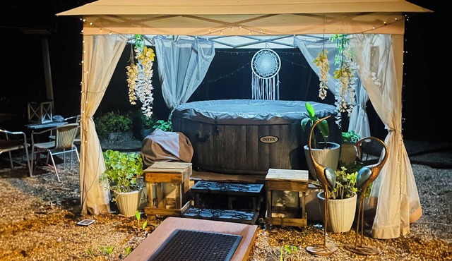 BEAUTIFUL COUNTRY RETREAT with spacious gardens, hot tub, wood fire & much more!