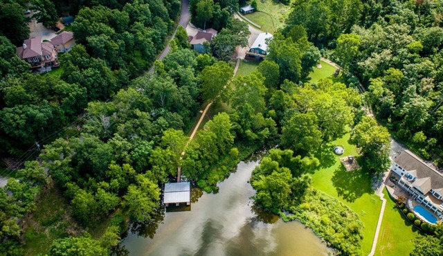 Beautiful country home on three acres and three hundred feet of waterfront.