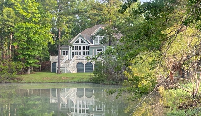 Beautiful Custom Home Overlooking Pond