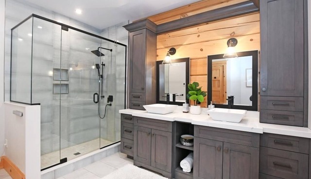 Beautiful Custom Log Home nestled on 300 ft beach front