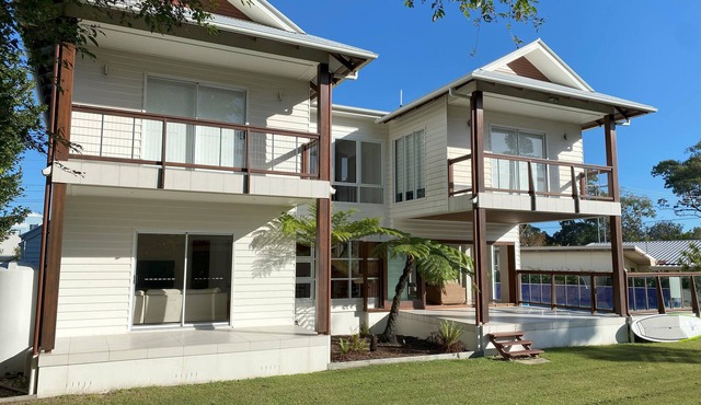 Beautiful family beach house with pool, adjacent to the bays best swimming beach