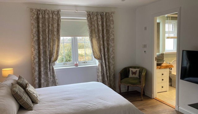 Beautiful garden apartment surrounded by woodland and fields.