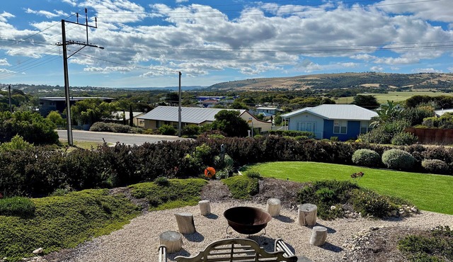 Beautiful home 150m to Boomer Beach with views to the hills, sleeps 8.