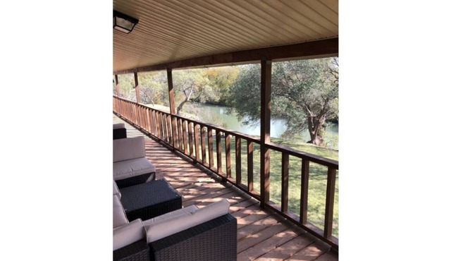 Beautiful home in a private country setting overlooking the San Saba River.