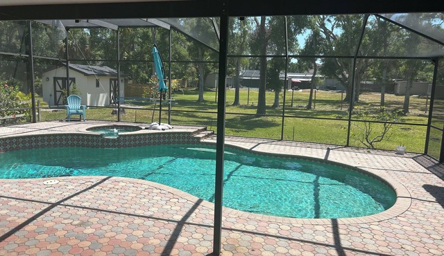 Beautiful home in the woods yet 5 mins away from the city. 3-bedroom 2 Bath/Pool
