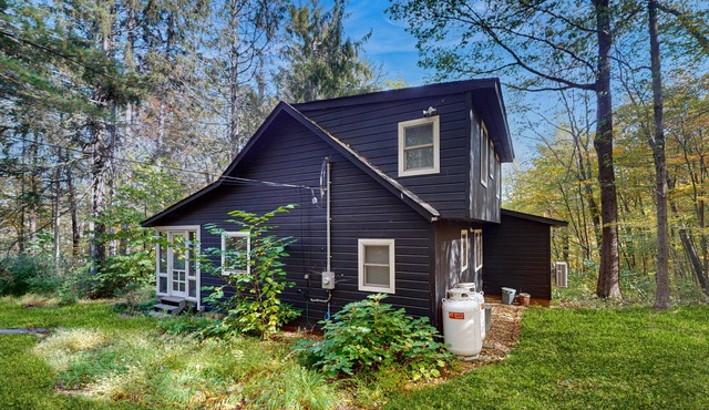 Beautiful home on acres with deck, fenced area & fireplace