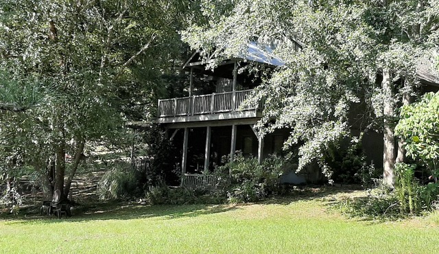 Beautiful home on pond with several decks in very private and quiet neighborhood
