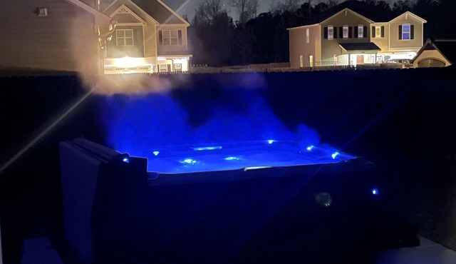 Beautiful home with Viking Royale Spa conveniently located near the Marines.