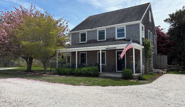 Beautiful home with oversized pool and hot tub, spacious yard, walk to beach