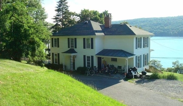 Beautiful House and Yard, Stunning View, 120' Lakefront, Covered Front Porch