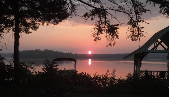 Beautiful lake-home, plus separate cottage, 200+ feet level shoreline,1.3 acres