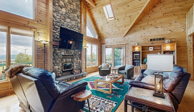 Beautiful lake view home with decks, grill, soaking tub & fireplace