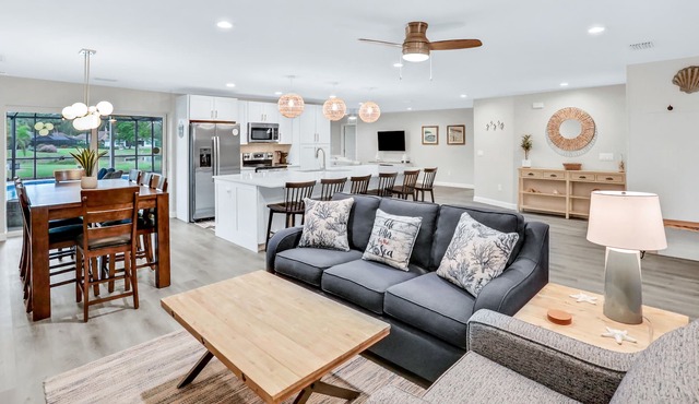 Beautiful lake-view home with screened lanai, private pool & W/D