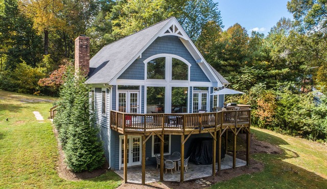 Beautiful lakefront home with fireplace, deck, central AC, & washer/dryer