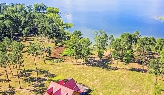 Beautiful Lakefront Log Cabin that will take your breath away.