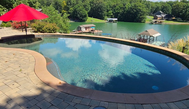 Beautiful lakeside family or corporate retreat with pool, hot tub, and more!