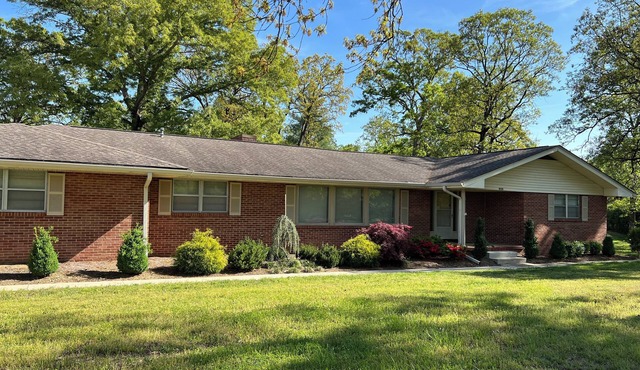 Beautiful large home on Lake Chickamauga at Dallas Bay with private boat ramp.