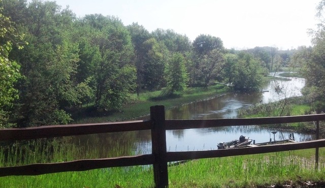 Beautiful Lodge on the Big Manistee River, with cabins for extended family.