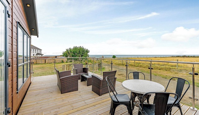 Beautiful lodge with sea views and access straight onto the beach.