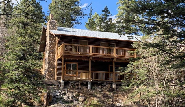 Beautiful log cabin high above the Rio Ruidoso River. The Log & Order Cabin.