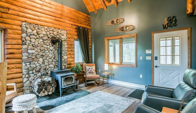 Beautiful Log Cabin Tucked Away on 5 Acres