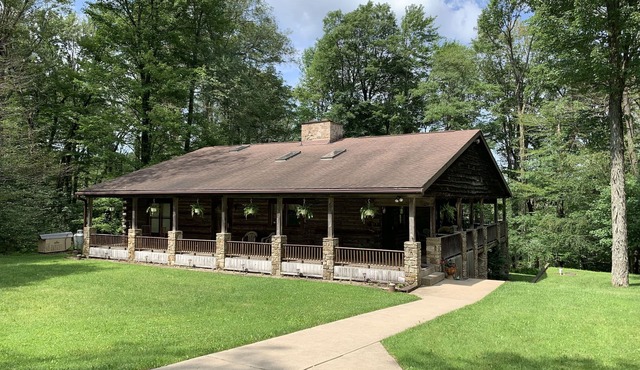 Beautiful log home retreat located on the Northwest peak of PA/New York boarder