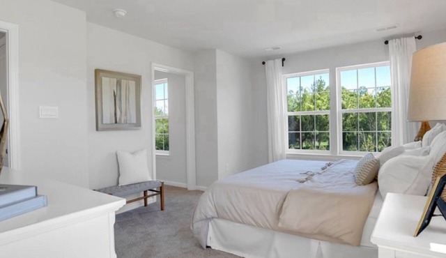 Beautiful master bedroom suite w/ King bed and attached bathroom!