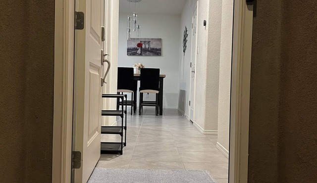 Beautiful modern new home centrally located & 7 minutes from SAF Airport with AC