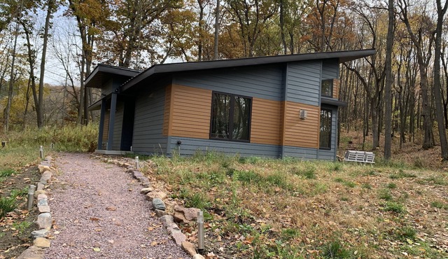 Beautiful new contemporary home, quiet wooded lot minutes from Devils Lake