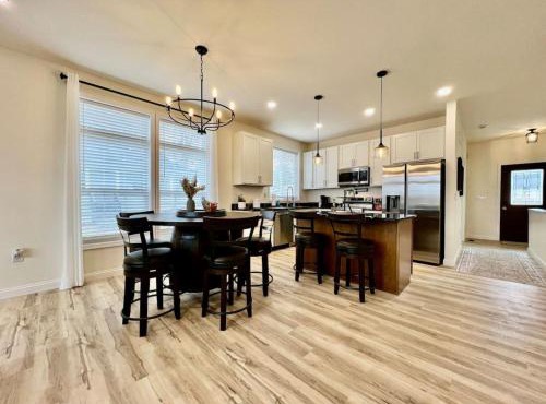 Beautiful NEW Ranch Home with a large deck and games