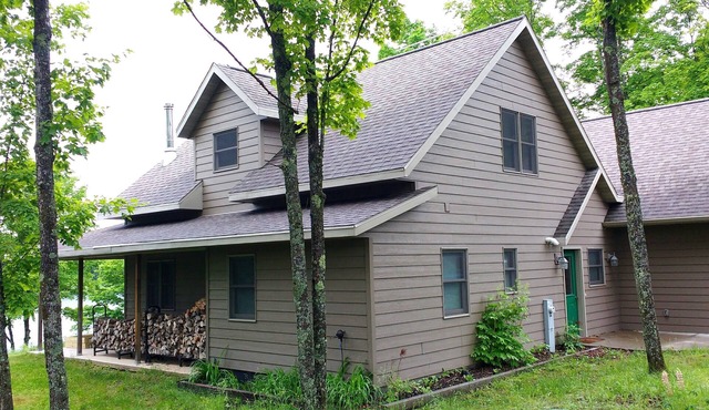 Beautiful newer home on the sunny side of peaceful Camp Lake in Iron River